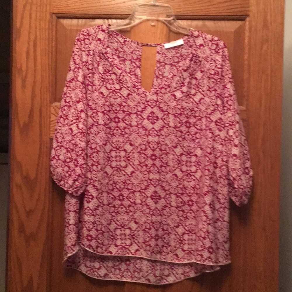Women’s three quarter length sleeve blouse.